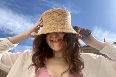 woman wearing Lack of Color Inca Bucket Hat