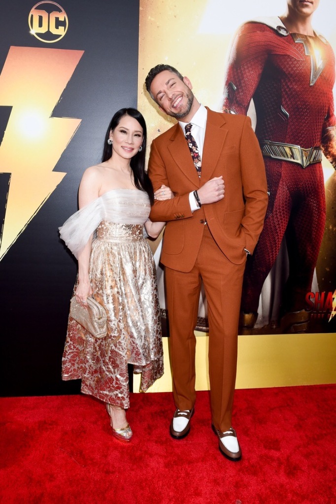 Lucy Liu and Zachary Levi attend the premiere of Warner Bros.' "Shazam 2" at Regency Village Theatre on March 14, 2023 in Los Angeles, California.