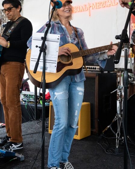 Renee Zellweger performs with CM Talkington during SXSW on March 17, 2023 in Austin.