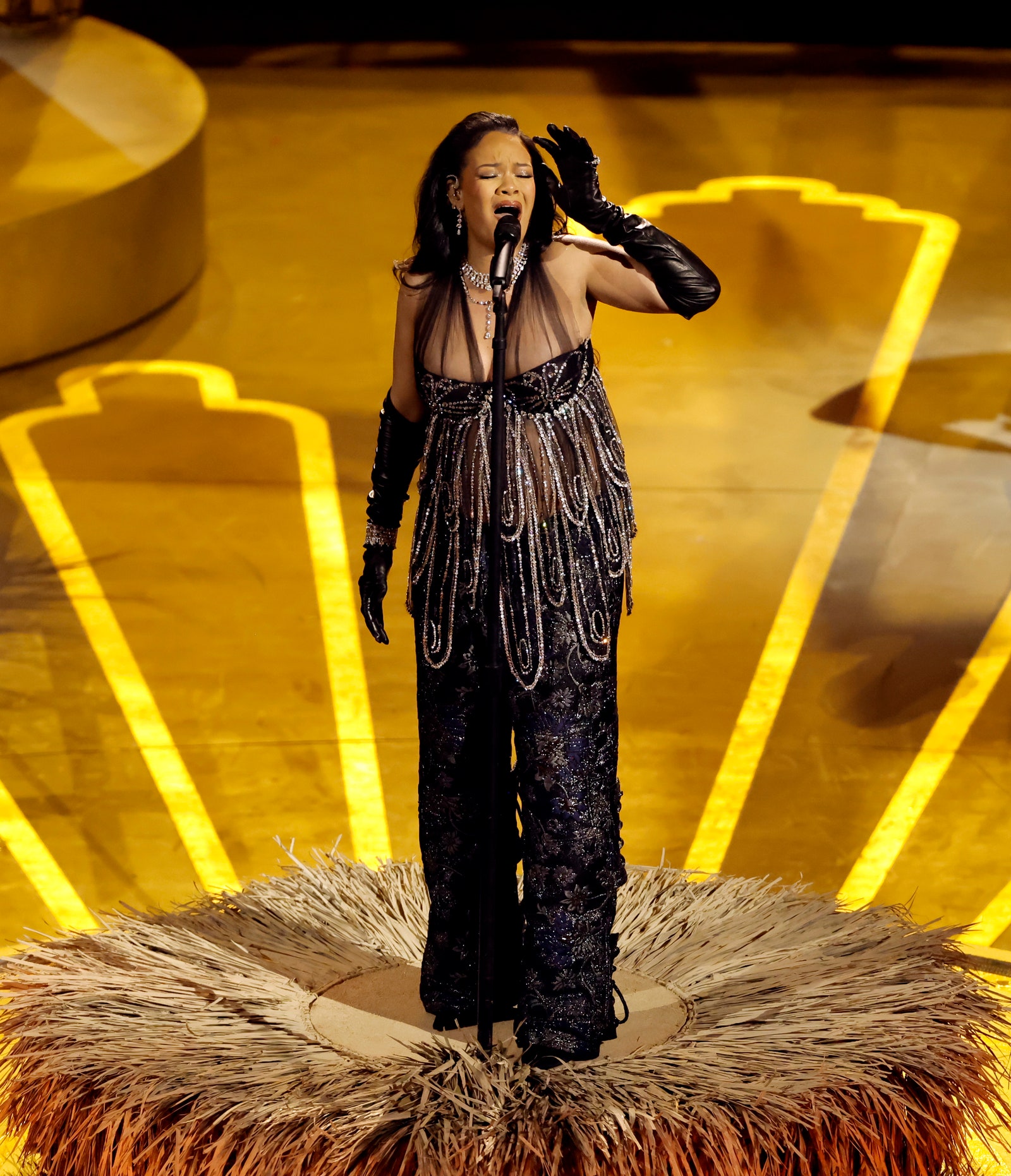 Rihanna Swapped Her Leather Look for a Beaded TwoPiece Ensemble for Her Oscars Performance