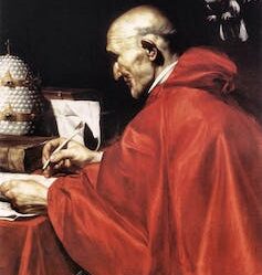 Painting of Pope Gregory the Great writing at a desk wearing a shiny red cape.