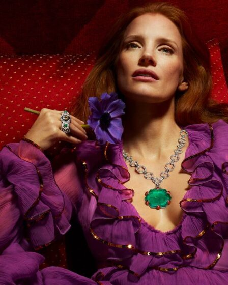Jessica Chastain stars in a campaign for Gucci's high jewellery collection wearing a purple dress and emerald pendant.
