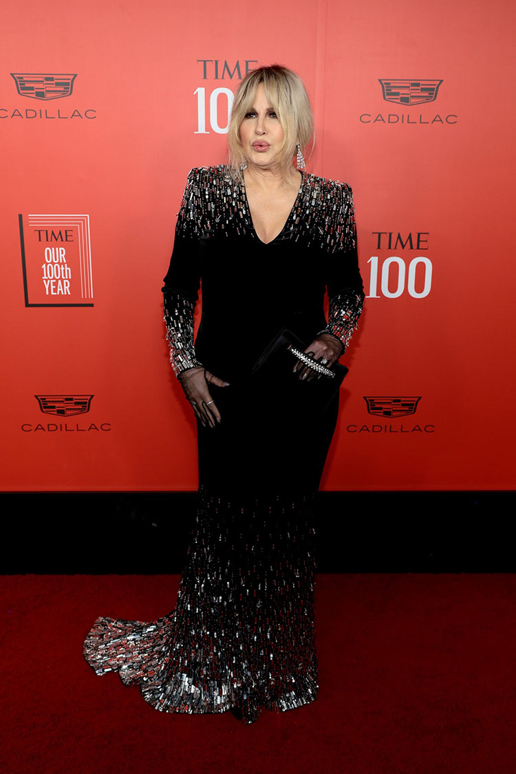 Jennifer Coolidge, who was a diehard Dolce & Gabbana girl during awards season, looked beautiful wearing a custom Balmain black velvet gown accented with crystals which was inspired by the Fall 2023 collection.

TIME100