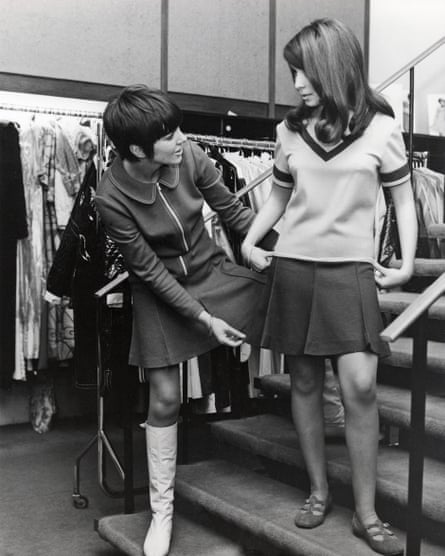 Mary Quant advises a client about a miniskirt at her London store Bazaar.