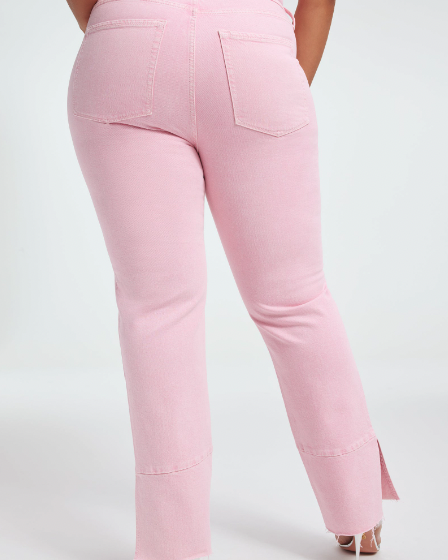 Product shot of a model wearing Good American's Good Boy Jeans in pink