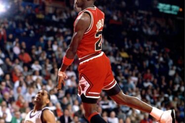 Michael Jordan scores a basket