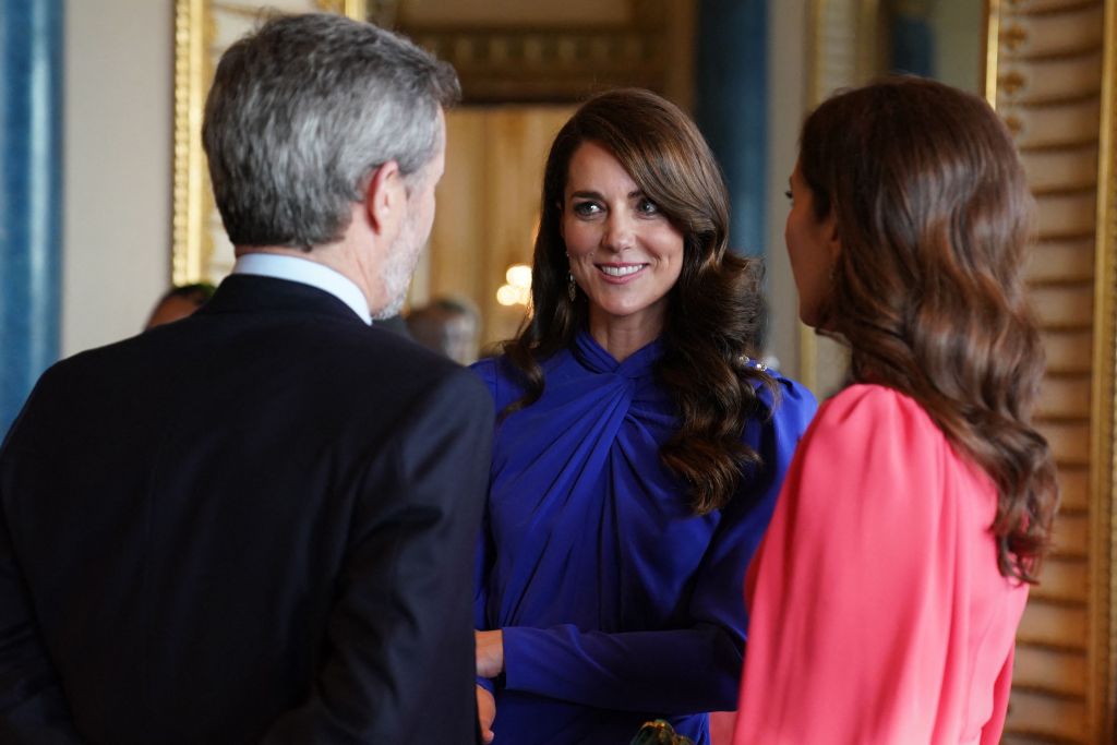 Britain's Catherine, Princess of Wales (C) speaks with Crown Princess Mary of Denmark and Crown Prince Frederik of Denmark during a reception for overseas guests attending the coronation of Britain's King Charles III, at Buckingham Palace in central London on May 5, 2023. (Photo by Jacob King / POOL / AFP) (Photo by JACOB KING/POOL/AFP via Getty Images)