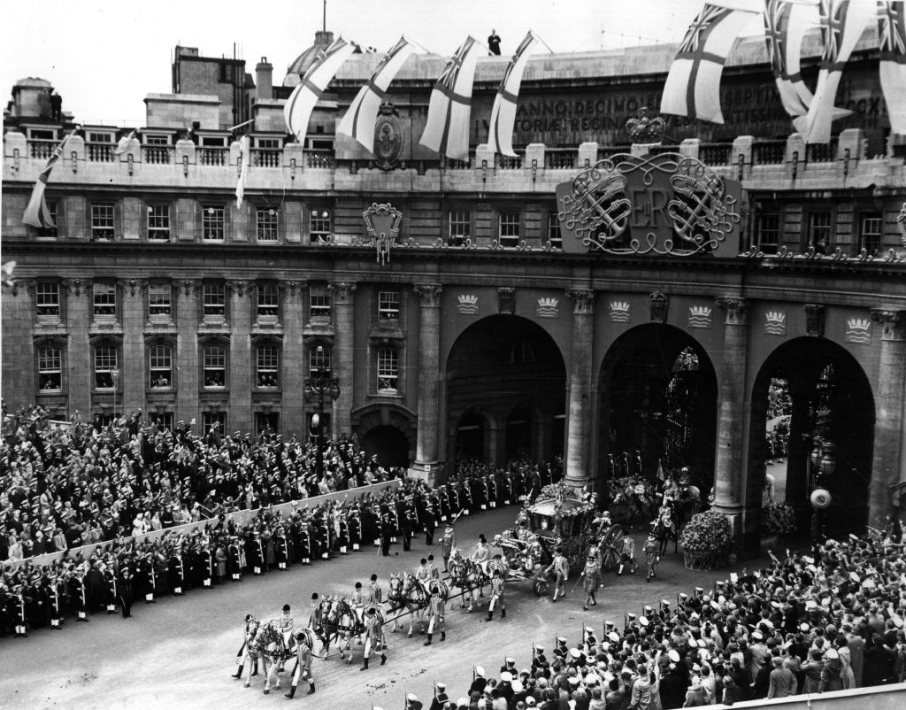 2nd June 1953: Queen Elizabeth II Coronation carriage and procession coming through Admiralty Arch on the way from Westminster Abbey to Buckingham Palace. (Photo by Hulton Archive/Getty Images)