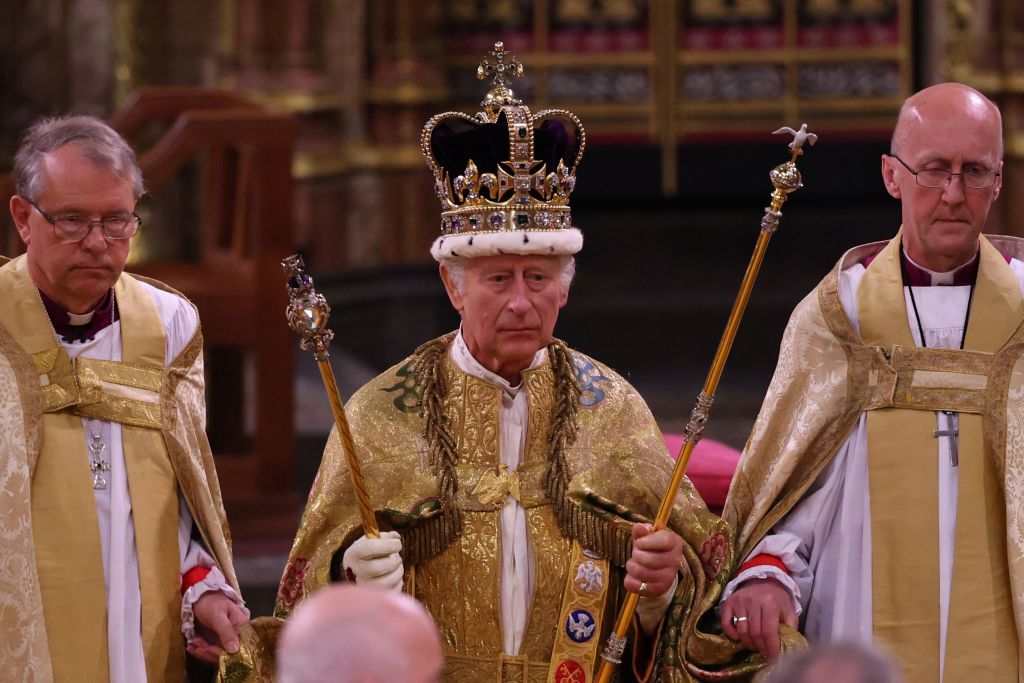 Britain's King Charles III with the St Edward's Crown on his head attends the Coronation Ceremony inside Westminster Abbey in central London on May 6, 2023. - The set-piece coronation is the first in Britain in 70 years, and only the second in history to be televised. Charles will be the 40th reigning monarch to be crowned at the central London church since King William I in 1066. Outside the UK, he is also king of 14 other Commonwealth countries, including Australia, Canada and New Zealand. Camilla, his second wife, will be crowned queen alongside him and be known as Queen Camilla after the ceremony. (Photo by Richard POHLE / POOL / AFP) (Photo by RICHARD POHLE/POOL/AFP via Getty Images)