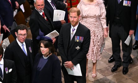 Prince Harry leaves Westminster Abbey after the coronation