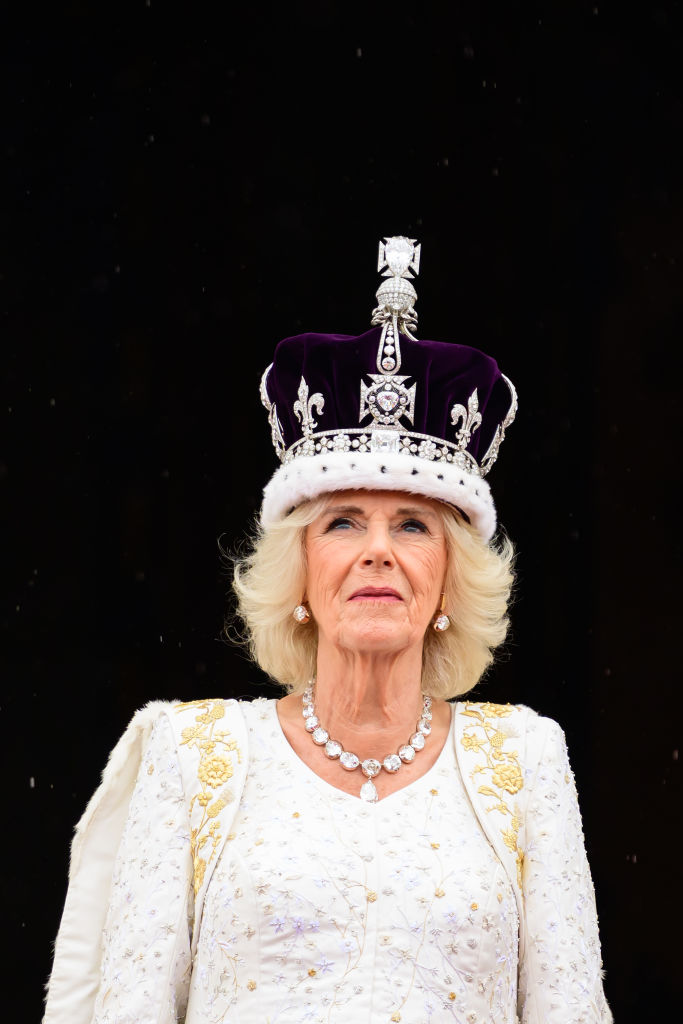 LONDON, ENGLAND - MAY 06: Queen Camilla is seen on the balcony of Buckingham Palace during the Coronation of King Charles III and Queen Camilla on May 06, 2023 in London, England. The Coronation of Charles III and his wife, Camilla, as King and Queen of the United Kingdom of Great Britain and Northern Ireland, and the other Commonwealth realms takes place at Westminster Abbey today. Charles acceded to the throne on 8 September 2022, upon the death of his mother, Elizabeth II. (Photo by Leon Neal/Getty Images)