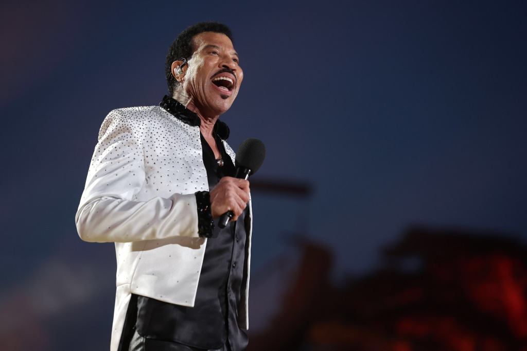 Lionel Richie performs on stage during the Coronation Concert on May 07, 2023 in Windsor, England. The Windsor Castle Concert is part of the celebrations of the Coronation of Charles III and his wife, Camilla, as King and Queen of the United Kingdom of Great Britain and Northern Ireland, and the other Commonwealth realms that took place at Westminster Abbey yesterday. Performers include Take That, Lionel Richie, Katy Perry, Paloma Faith, Olly Murs, Andrea Bocelli and Sir Bryn Terfel, Alexis Ffrench, Lang Lang & Nicole Scherzinger, Bette Midler, Tiwa Savage, Steve Winwood, Pete Tong and The Coronation Choir. 