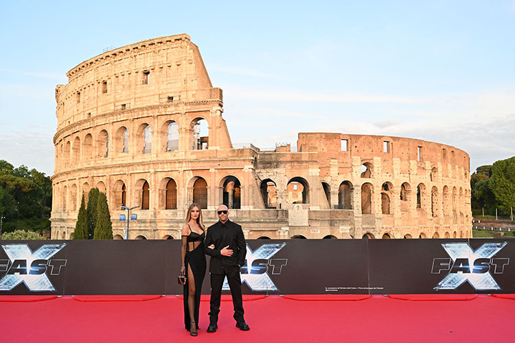 British actor Jason Statham and his partner Rosie Huntington-Whiteley arrive for the Premiere of the film "Fast X", the tenth film in the Fast & Furious Saga, on May 12, 2023 at the Colosseum monument in Rome. (Photo by Alberto PIZZOLI / AFP) (Photo by ALBERTO PIZZOLI/AFP via Getty Images)