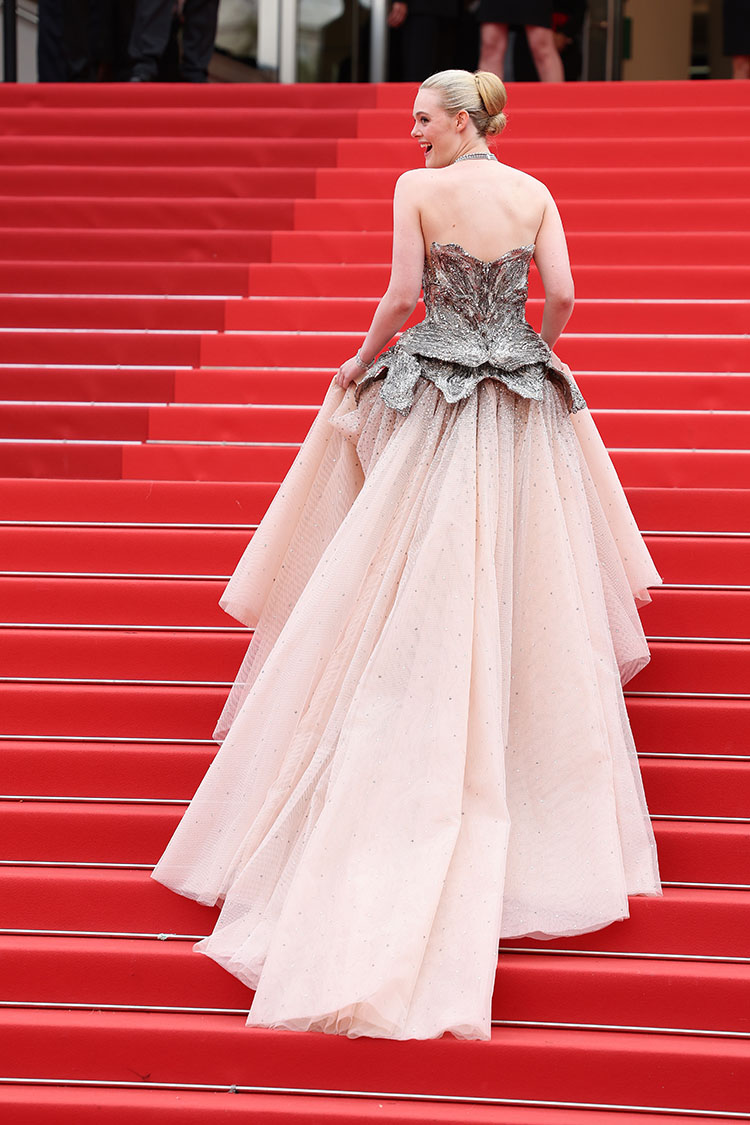 CANNES, FRANCE - MAY 16: Elle Fanning attends the "Jeanne du Barry" Screening & opening ceremony red carpet at the 76th annual Cannes film festival at Palais des Festivals on May 16, 2023 in Cannes, France. (Photo by Pascal Le Segretain/Getty Images)