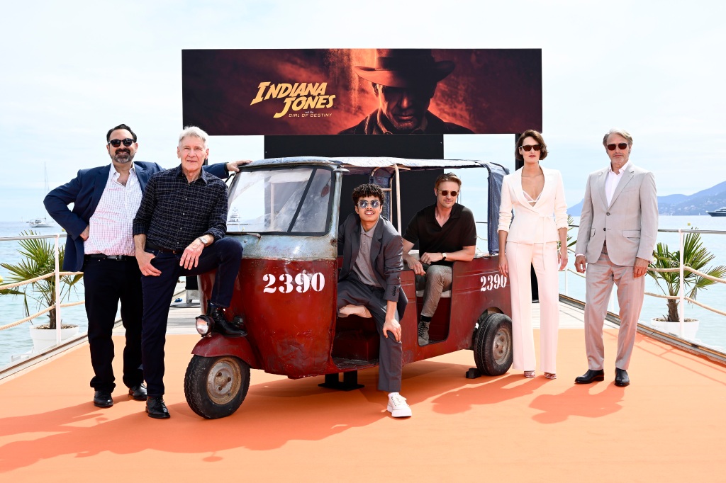 CANNES, FRANCE - MAY 18: (L-R) James Mangold, Harrison Ford, Ethann Isidore, Boyd Holbrook, Phoebe Waller-Bridge, and Mads Mikkelsen attend 