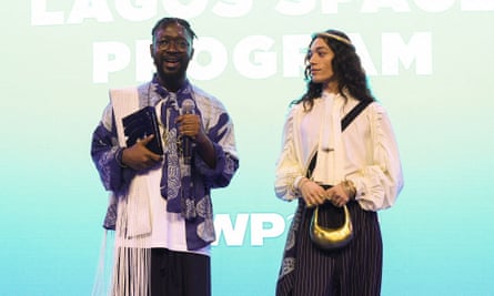 Adeju Thompson of Lagos Space Programme, left, accepting the International Woolmark prize.