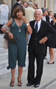 PARIS - JULY 03: Italian fashion icon Giorgio Armani (R) poses with Singer Tina Turner (L) in the courtyard  of the Elysee Palace before attending a ceremony at the president's official residence for honorees of France's most prestigious Legion D'Honneur award on July 3, 2008 in Paris, France.  (Photo by Pascal Le Segretain/Getty Images)