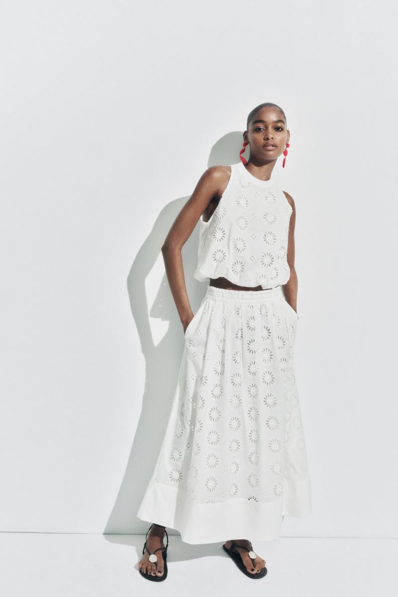 White midi length skirt with eyelet details from Zara.