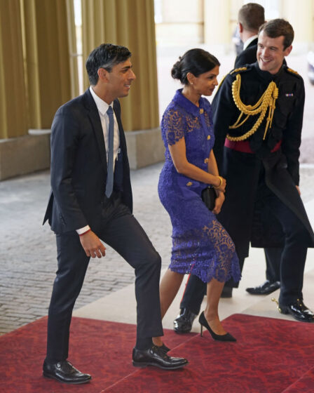 Prime Minister Rishi Sunak and his wife Akshata Murty arrive for a reception at Buckingham Palace, hosted by King Charles III, for overseas guests attending his coronation