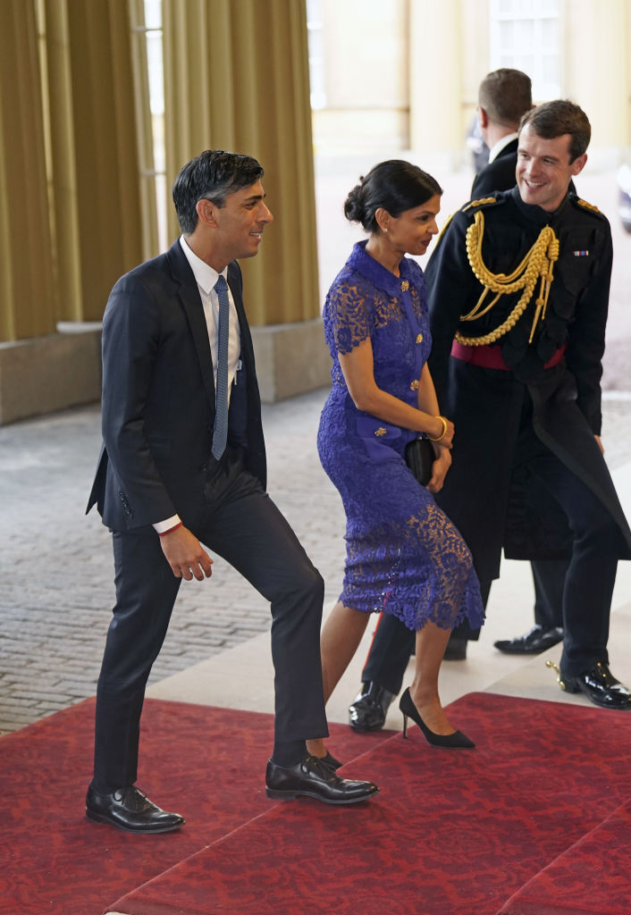 Prime Minister Rishi Sunak and his wife Akshata Murty arrive for a reception at Buckingham Palace, hosted by King Charles III, for overseas guests attending his coronation