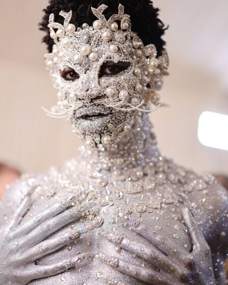 Lil Nas X wore a crystal-and-pearl cat prosthetic by Pat McGrath using Swarovski materials to the 2023 Met Gala.