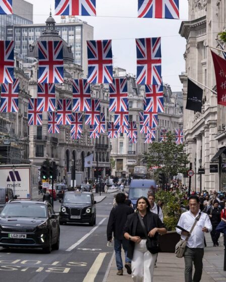 Major London shopping artery Regent Street is decked out in Union Jacks ahead of the Coronation on May 6.