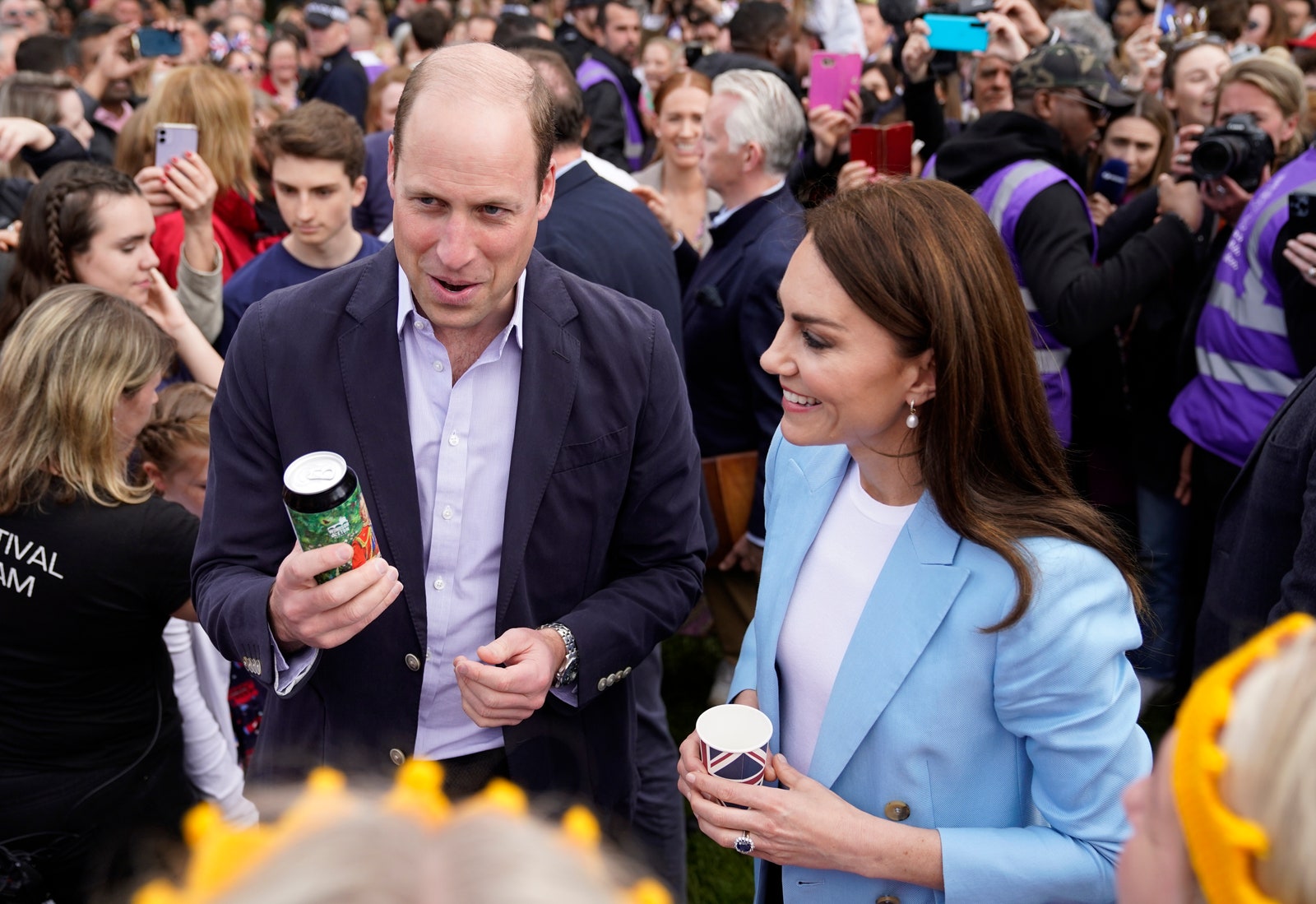 Prince William Prince of Wales holds a can of 'Return of the King' Coronation Ale as he stands next to Catherine...