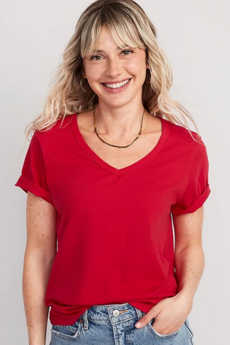 Smiling woman wearing red tshirt, part of the Old Navy summer clothes collection.