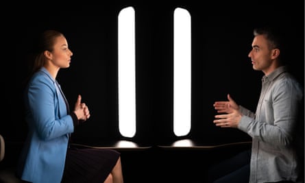 Two people have a virtual meeting in a Framery Connect pod