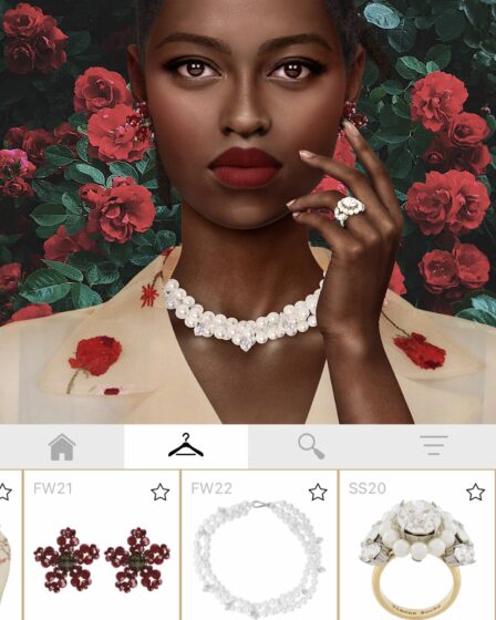 A screen capture from the game shows a digital model in a Simone Rocha necklace, earrings and ring.