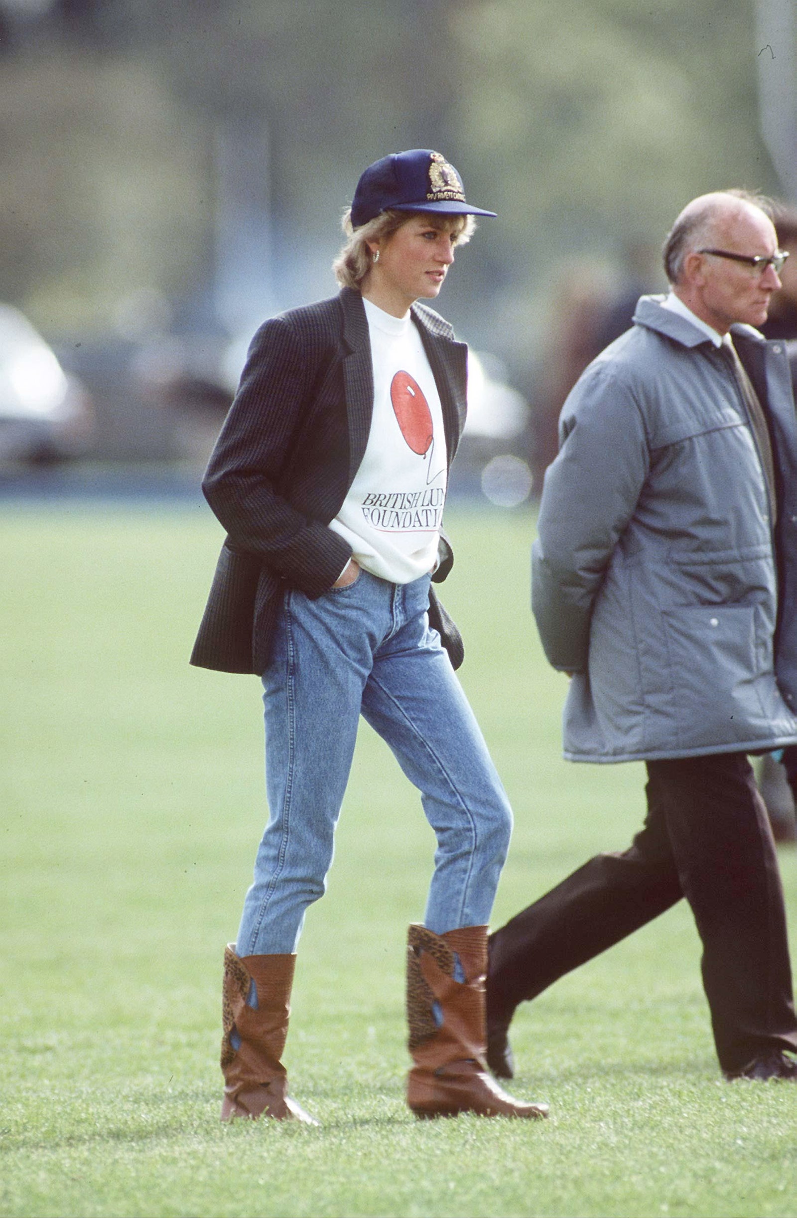 WINDSOR UNITED KINGDOM  MAY 02 Princess Diana Wearing A British Lung Foundation Sweatshirt A Baseball Cap Boots And...