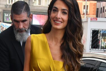 Amal Clooney wears a stunning golden jumpsuit at Madrid conference