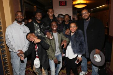 Caleb McLaughlin with The New Edition Story cast including director Chris Robinson
