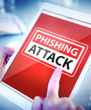 Hands Holding Tablet Phishing Attack