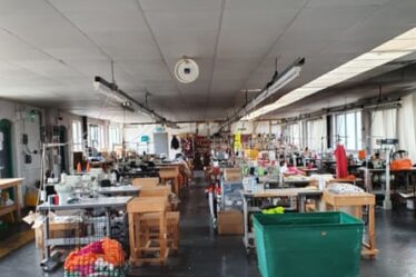 A Leicester garment workshop which says it has paused production after being asked to accept a discount on goods already delivered