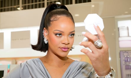 Rihanna with a high ponytail.