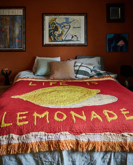 The bedroom with an art quilt, saying Life is Lemonade