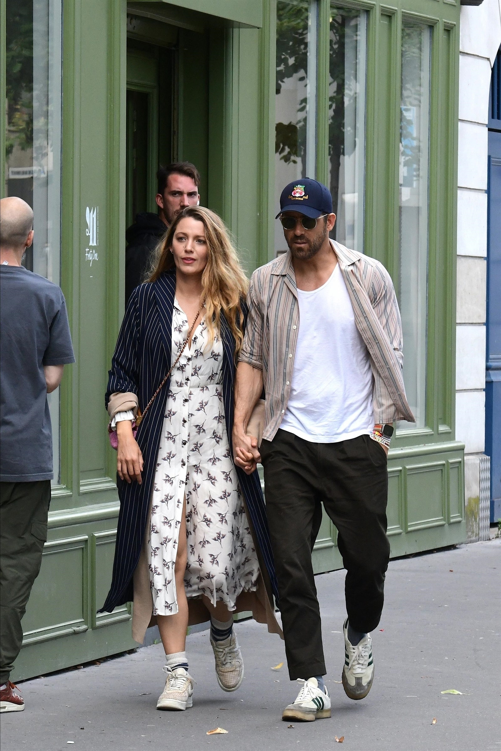 Ryan Reynolds and Blake Lively savor the delights of Paris holding hands