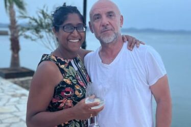 Sheema with Alfred, drinking next to the sea in Albania, 2022