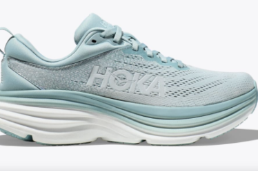 Product shot of a pair of Hoka Bondi 8 sneakers in a light blue color
