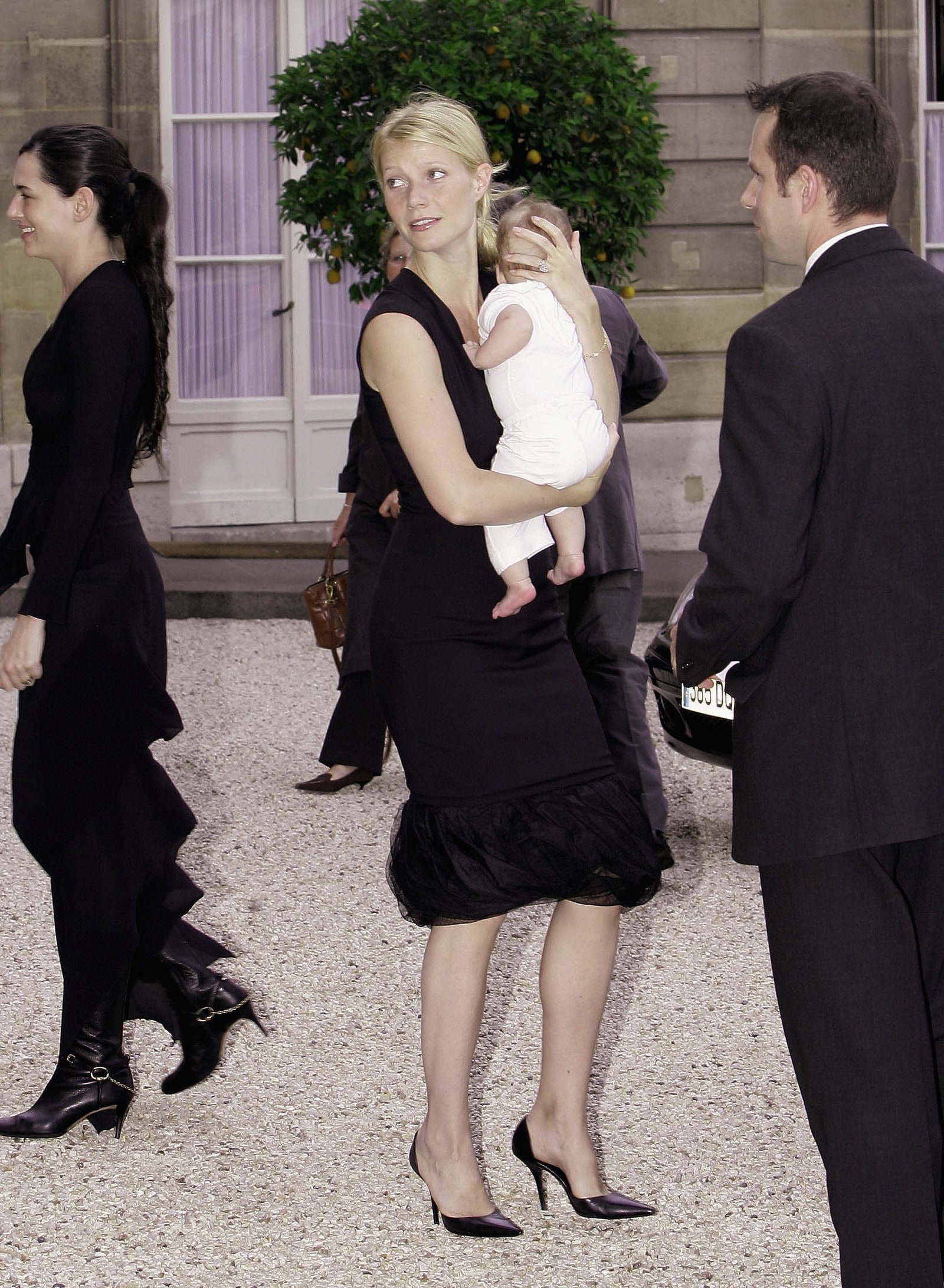 Actress Gwyneth Paltrow holds her baby Apple Martin as they attend the ceremony where director Steven Spielberg was...