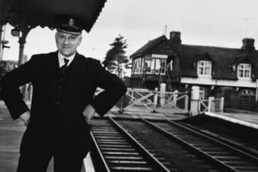 Station master Edmond Skillings posing on a platform at Wolferton Royal Station in Norfolk in December 1960