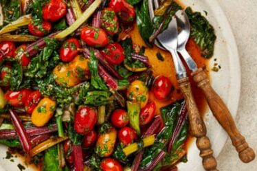 Yotam Ottolenghi’s garlicky chard with five-spice tomatoes.