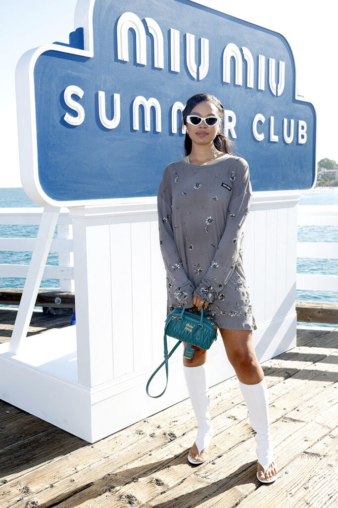 Nesta Cooper attends Miu Miu Summer Club Malibu at the Malibu Pier 