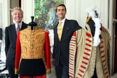 Edward Sexton, left, and curator James Sherwood with some of the clothes on display at the Savile Row exhibition in Paris, France, in 2007.
