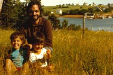 Charlotte Gill as a child with her dad and brother by a river