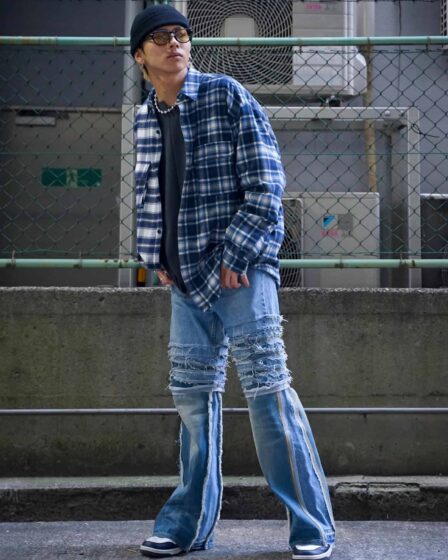 man wearing a baggy flare jeans