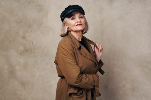 older woman trench coat
