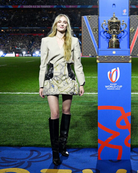 PARIS, FRANCE - OCTOBER 28: The Webb Ellis Cup arrives in the Louis Vuitton trunk, as Sophie Turner and Dan Carter pose for a photo prior to kick-off ahead of the Rugby World Cup Final match between New Zealand and South Africa at Stade de France on October 28, 2023 in Paris, France. (Photo by David Ramos - World Rugby/World Rugby via Getty Images)
