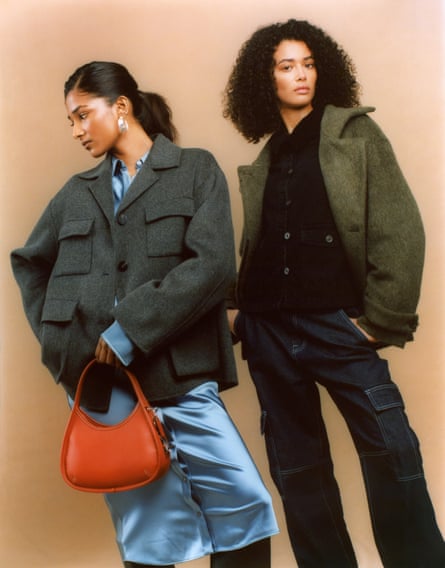 Models wearing grey wool coat with four patch pockets and green fuzzy wool coat